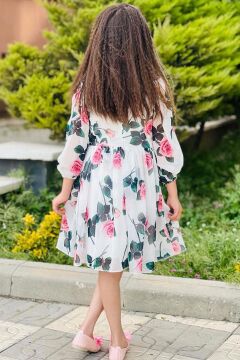 Kız Çocuk Yakası Bağlama Detaylı Üzeri Gül Desenli Piliseli Beyaz Elbise