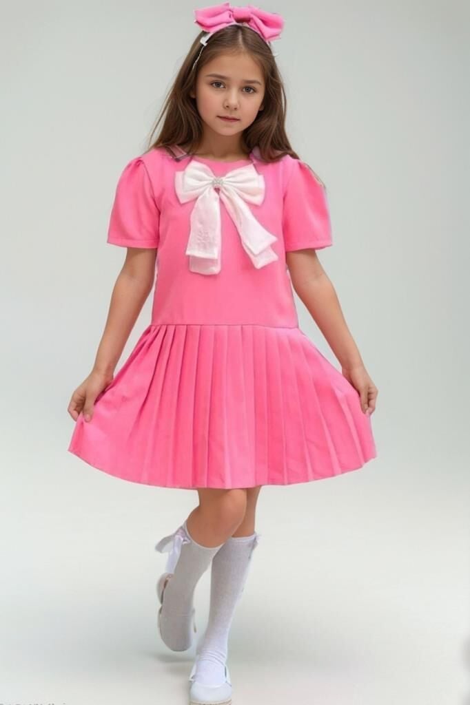 Kız Çocuk Göğsü Fiyonk Detaylı Eteği Pliseli Pembe Elbise