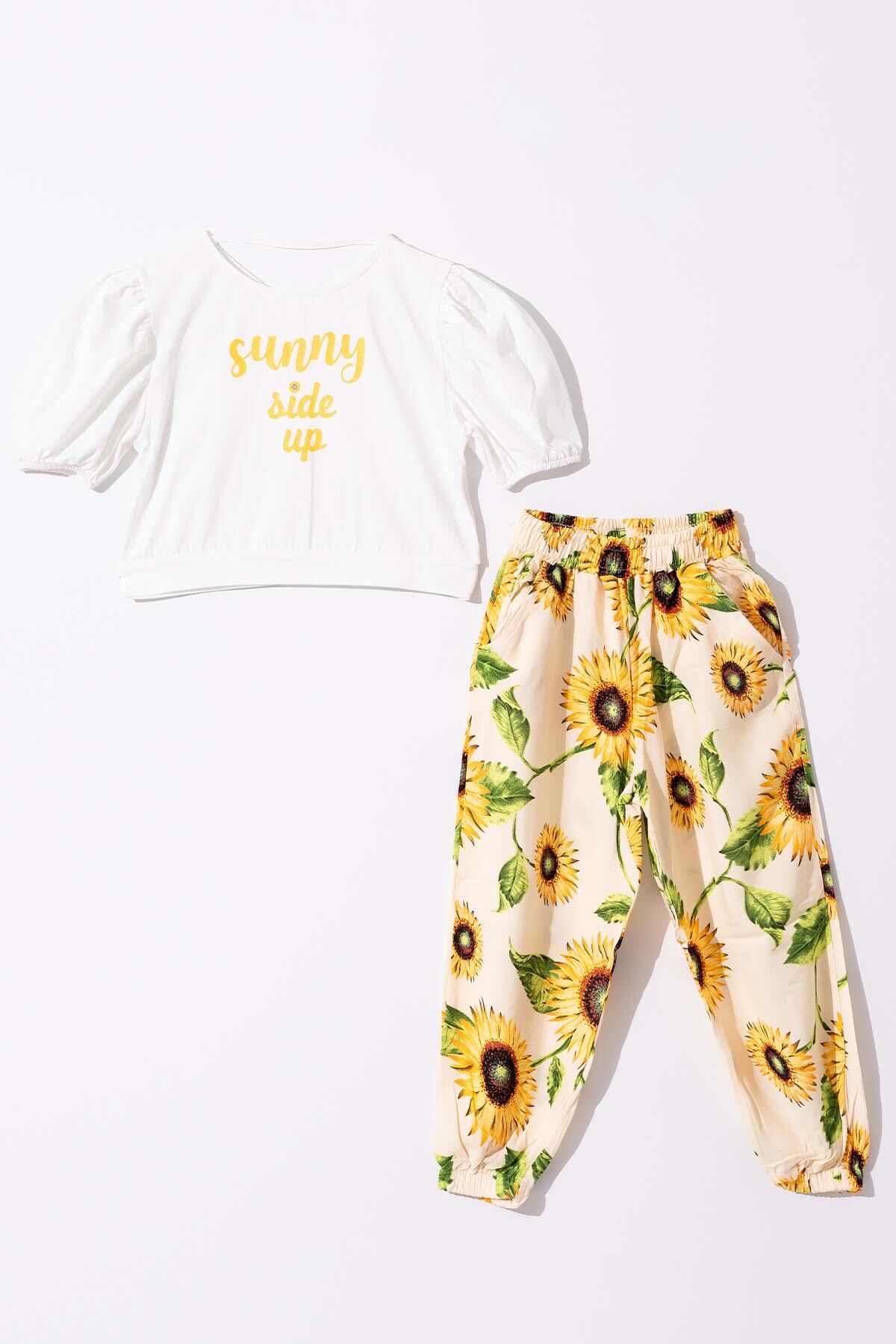 Kız Çocuk Ay Çiçeği Desenli  Eşofman Altı ve Yazı Baskılı Beyaz Eşofman Takım