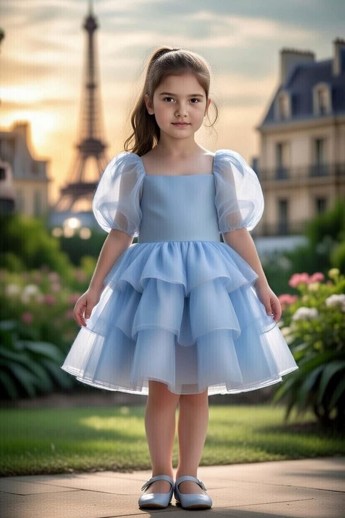 Kız Çocuk Kare Yaka Üzeri Kat Kat Pliseli Balon Kollu Kabarık Mavi Abiye