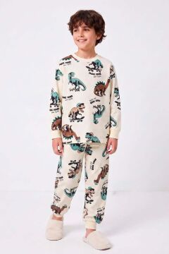 Erkek Çocuk Üzerinde Dino ve Kaykay Baskılı Krem Pijama Takımı