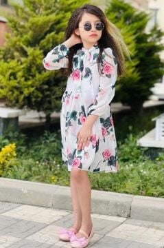 Kız Çocuk Üzeri Çiçek Baskılı ve Yakadan Bağlamalı Eteği Pliseli Beyaz Elbise