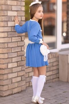 Kız Çocuk Beli Şerit ve Göğsü Fiyonk Detaylı Eteği Piliseli Mavi Şifon Elbise