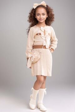 Kız Çocuk Beli Şerit ve Göğsü Fiyonk Detaylı Eteği Piliseli Krem Şifon Elbise