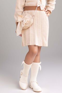 Kız Çocuk Beli Şerit ve Göğsü Fiyonk Detaylı Eteği Piliseli Krem Şifon Elbise