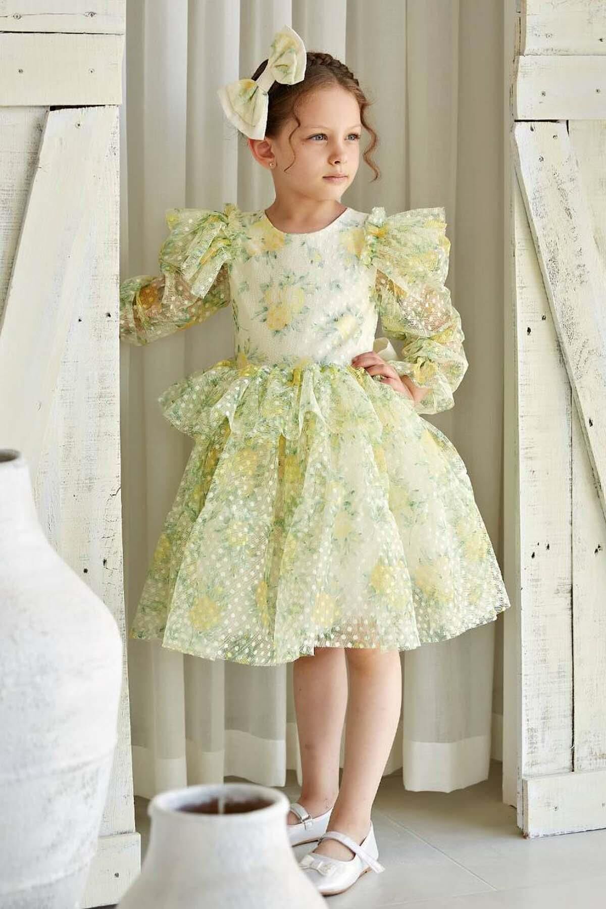 Kız Çocuk Omuzları ve Beli Fırfırlı Puantiye Detaylı Şeffaf Tül Çiçek Desenli Kabarık Sarı Elbise