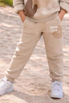 Kız Çocuk Digital Çiçek Baskı ve Aloha Crew Yazı Detaylı Bej Eşofman Takım