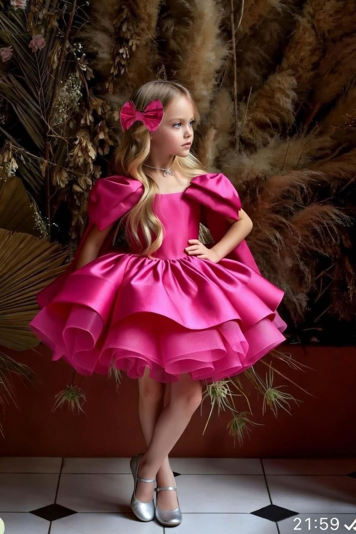 Kız Çocuk Omuzları Fiyonk Detaylı Kayık Yaka İçi astarlı Eteği Kabarık Fuşya Abiye