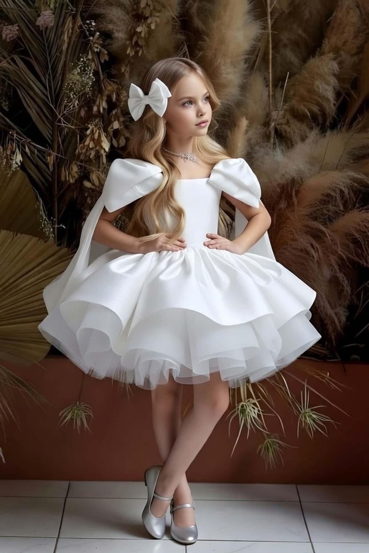 Kız Çocuk Omuzları Fiyonk Detaylı Kayık Yaka İçi astarlı Eteği Kabarık Beyaz Abiye