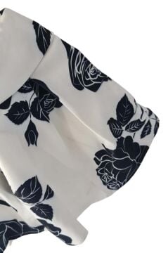 Kız Çocuk Beli Manşetli Yandan Fermuarlı Üzeri Gül Baskılı Kabarık Beyaz Etek